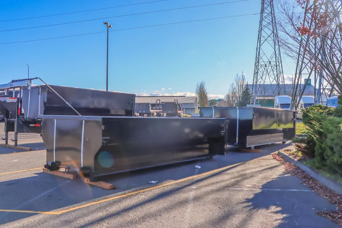 Roll-off dumpster ready for waste disposal at job site for Yard Waste Dumpster Rental in Pecan Grove